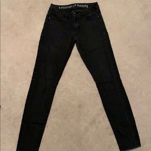 Black articles of society jeans